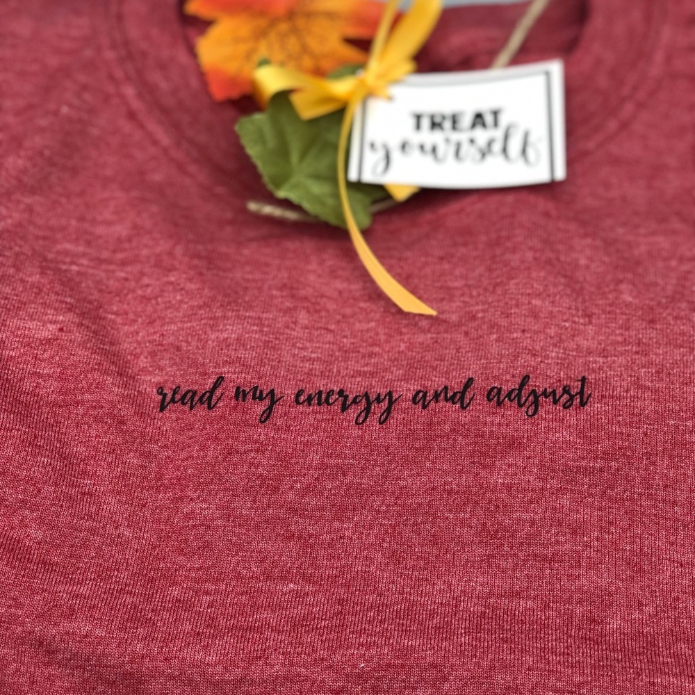 Soft red crew neck “read my energy and adjust”